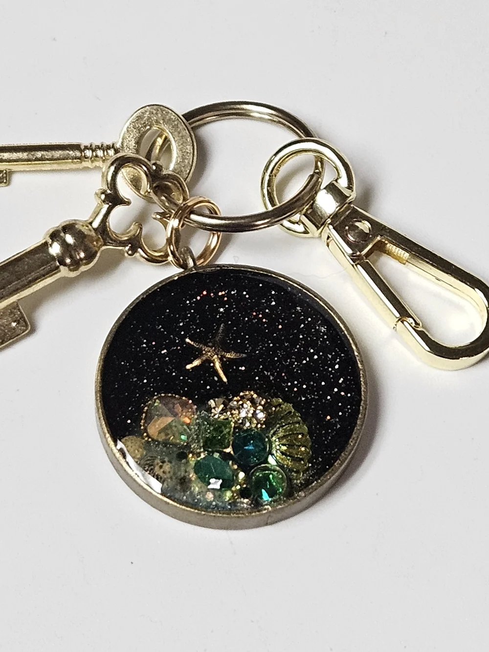 Gold Acquatic Keychain Bag Charm Black Galaxy and Green Crystal Accents